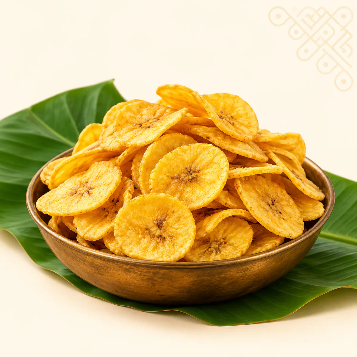 Nendram Banana Chips served in a traditional brass bowl on banana leaf